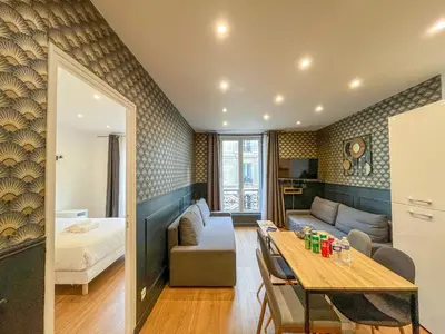 Coin salon dans l'établissement Urban Flat 18 - Charming 2BDR Parisian Home