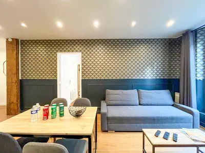 Coin salon dans l'établissement Urban Flat 18 - Charming 2BDR Parisian Home