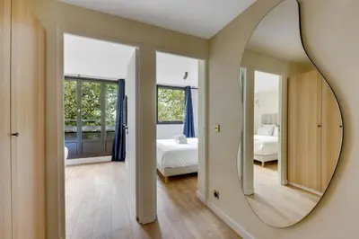 Un ou plusieurs lits dans un hébergement de l'établissement Appartement d'exception à Neuilly Achille Peretti I