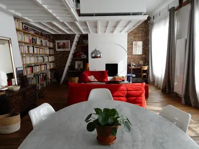 Coin salon dans l'établissement Loft style condo 4 people in central and trendy Paris