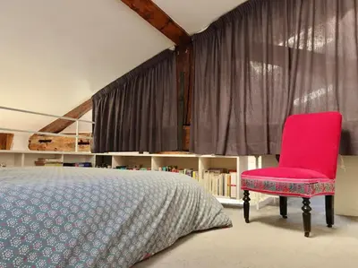 Un ou plusieurs lits dans un hébergement de l'établissement Loft style condo 4 people in central and trendy Paris