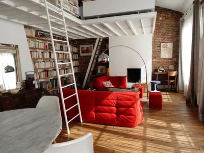 Coin salon dans l'établissement Loft style condo 4 people in central and trendy Paris