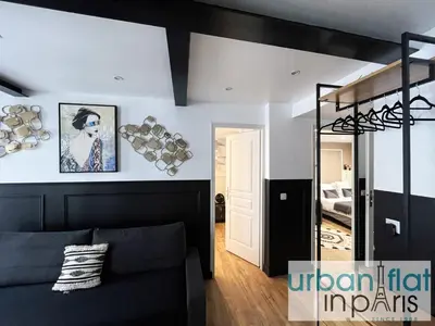 Un ou plusieurs lits dans un hébergement de l'établissement Urban Flat 13 - Pretty 2 Bedroom Parisian Flat