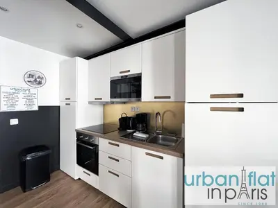 Cuisine ou kitchenette dans l'établissement Urban Flat 13 - Pretty 2 Bedroom Parisian Flat