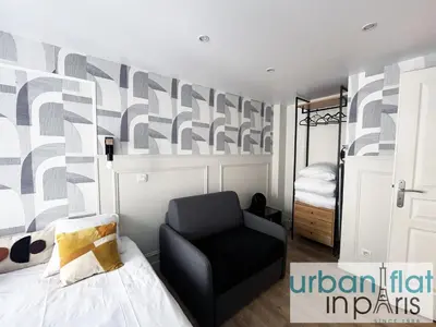 Un ou plusieurs lits dans un hébergement de l'établissement Urban Flat 13 - Pretty 2 Bedroom Parisian Flat