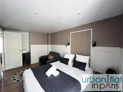 Un ou plusieurs lits dans un hébergement de l'établissement Urban Flat 13 - Pretty 2 Bedroom Parisian Flat