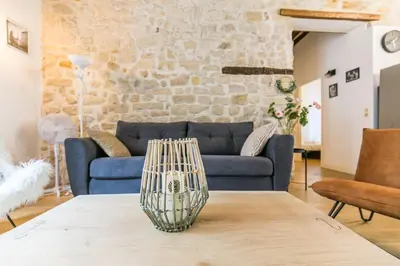 Coin salon dans l'établissement Cœur de Voltaire - Loft cosy Parisien
