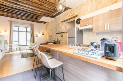 Cuisine ou kitchenette dans l'établissement Cœur de Voltaire - Loft cosy Parisien