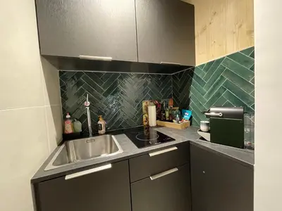 Cuisine ou kitchenette dans l'établissement 18 Montmartre