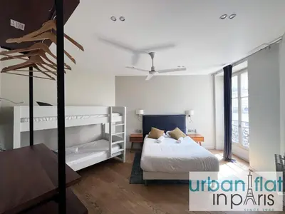 Un ou plusieurs lits dans un hébergement de l'établissement Urban Flat 71 - Amazing Apartment in Le Marais