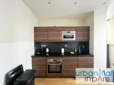 Cuisine ou kitchenette dans l'établissement Urban Flat 71 - Amazing Apartment in Le Marais