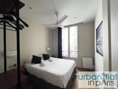 Un ou plusieurs lits dans un hébergement de l'établissement Urban Flat 71 - Amazing Apartment in Le Marais