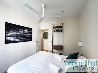 Un ou plusieurs lits dans un hébergement de l'établissement Urban Flat 71 - Amazing Apartment in Le Marais