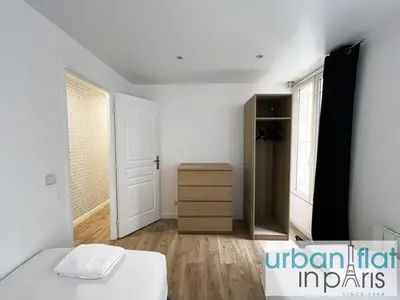 Un ou plusieurs lits dans un hébergement de l'établissement Urban Flat 14 - Charming 3 BDR Flat in Paris