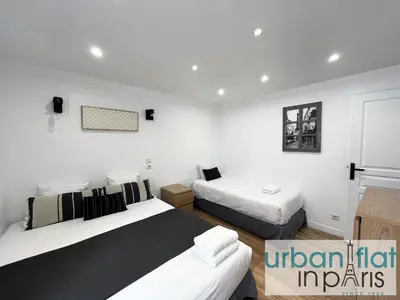 Un ou plusieurs lits dans un hébergement de l'établissement Urban Flat 14 - Charming 3 BDR Flat in Paris