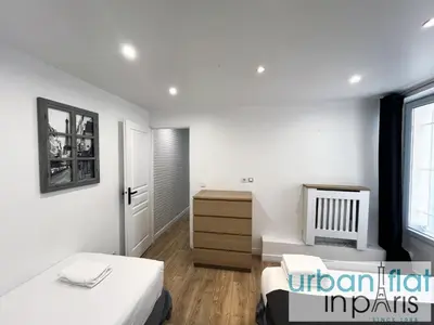 Un ou plusieurs lits dans un hébergement de l'établissement Urban Flat 14 - Charming 3 BDR Flat in Paris