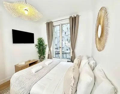 Un ou plusieurs lits dans un hébergement de l'établissement Porte de Versailles - Executive apartment with lift for 4