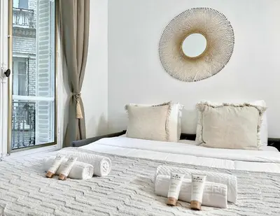 Un ou plusieurs lits dans un hébergement de l'établissement Porte de Versailles - Executive apartment with lift for 4