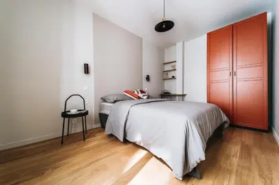 Un ou plusieurs lits dans un hébergement de l'établissement Hotel Particulier 3BDR 8PAX - Jardin du Luxembourg