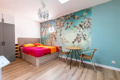 Un ou plusieurs lits dans un hébergement de l'établissement Gare du Nord Confortable pied à terre avec patio