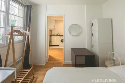 Un ou plusieurs lits dans un hébergement de l'établissement Flexliving - room - Banquier