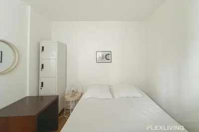 Un ou plusieurs lits dans un hébergement de l'établissement Flexliving - room - Banquier