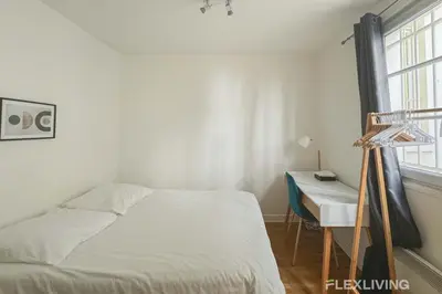 Un ou plusieurs lits dans un hébergement de l'établissement Flexliving - room - Banquier