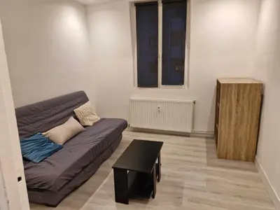 Coin salon dans l'établissement Studio meublé