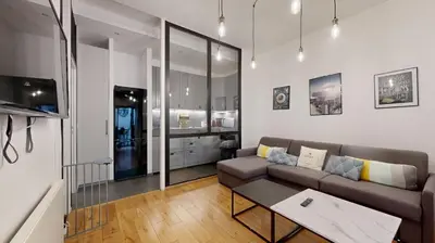 Télévision ou salle de divertissement dans l'établissement Bluestay 6 - Superbe appartement à Paris