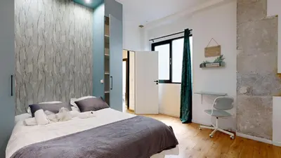 Un ou plusieurs lits dans un hébergement de l'établissement Bluestay 6 - Superbe appartement à Paris