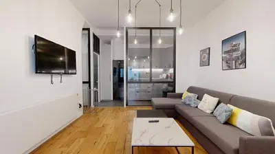 Télévision ou salle de divertissement dans l'établissement Bluestay 6 - Superbe appartement à Paris