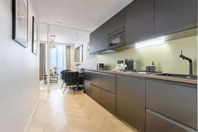 Cuisine ou kitchenette dans l'établissement Stylish 2 Bedroom near Montmartre Sacré Cœur