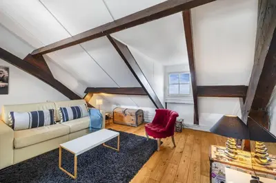 Coin salon dans l'établissement Marais Rooftop Apartment