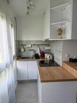 Cuisine ou kitchenette dans l'établissement 温馨公寓