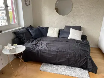 Un ou plusieurs lits dans un hébergement de l'établissement Charmant perchoir plein sud à Boulogne !