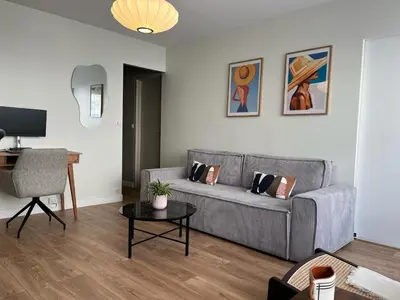 Coin salon dans l'établissement Bel appartement Ouest Parisien