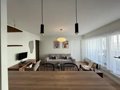 Télévision ou salle de divertissement dans l'établissement Bel appartement Ouest Parisien
