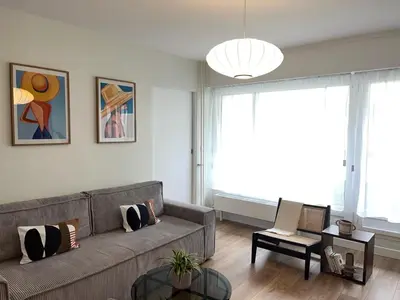 Coin salon dans l'établissement Bel appartement Ouest Parisien