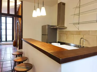 Cuisine ou kitchenette dans l'établissement Le Marais style APT with 3 bdrs 3 mns Republique N3-43