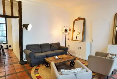 Coin salon dans l'établissement Le Marais style APT with 3 bdrs 3 mns Republique N3-43