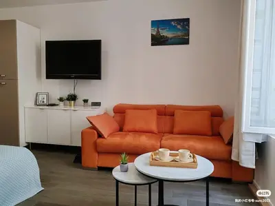 Coin salon dans l'établissement appartement champs elysees