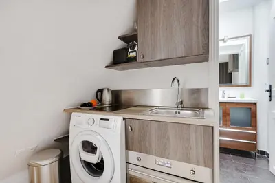 Cuisine ou kitchenette dans l'établissement Magnificent studio - 2P - Arc de Triomphe