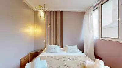 Un ou plusieurs lits dans un hébergement de l'établissement Bluestay 86 - Charmant appartement Paris 13