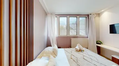 Un ou plusieurs lits dans un hébergement de l'établissement Bluestay 86 - Charmant appartement Paris 13
