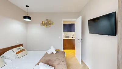 Un ou plusieurs lits dans un hébergement de l'établissement Bluestay 86 - Charmant appartement Paris 13