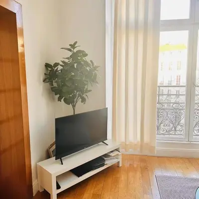 Télévision ou salle de divertissement dans l'établissement 2 bedrooms in marais