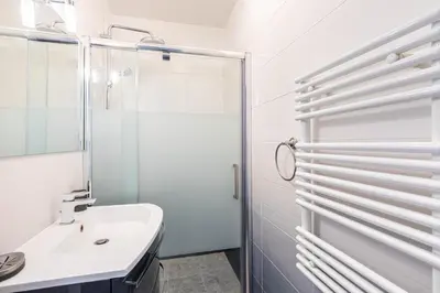 Salle de bains dans l'établissement GuestReady - Séjour familial dans le 20ème