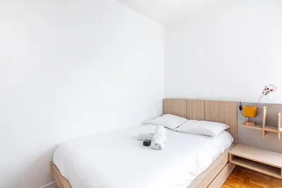 Un ou plusieurs lits dans un hébergement de l'établissement GuestReady - Séjour familial dans le 20ème