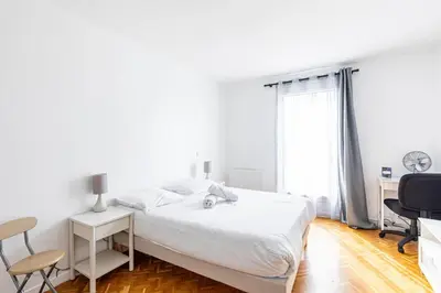 Un ou plusieurs lits dans un hébergement de l'établissement GuestReady - Séjour familial dans le 20ème