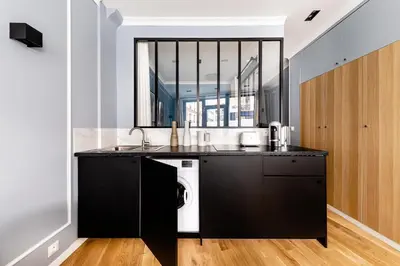 Cuisine ou kitchenette dans l'établissement Suite Notre Dame 1 Bedroom